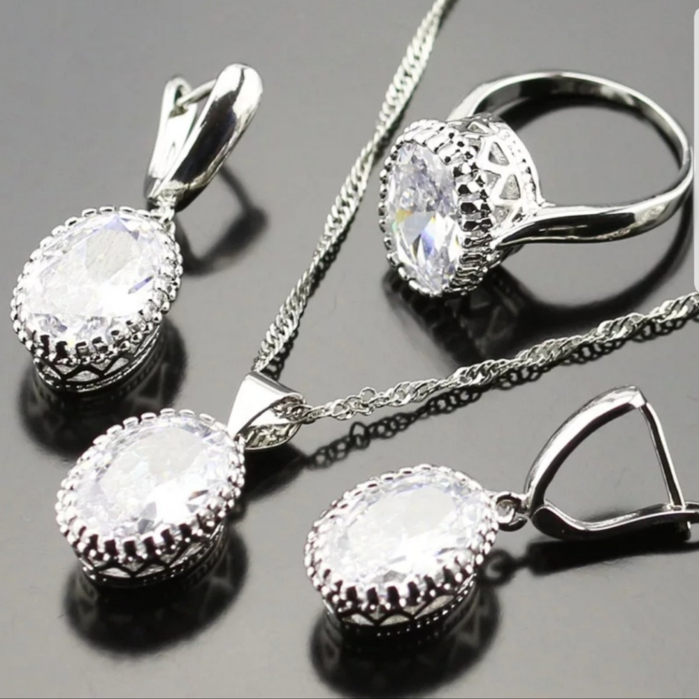 925sterling  silver set stamped with white sapphir